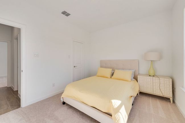 Bedroom featuring carpet and baseboards | Image 18