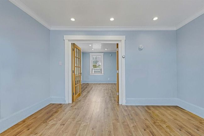 Unfurnished room featuring wood-style floors and | Image 13