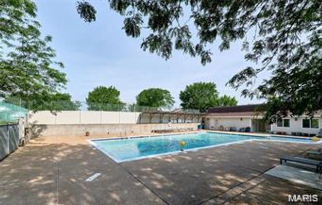 Community pool featuring a patio area | Image 24