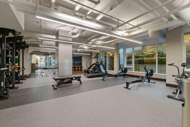 Exercise room featuring a healthy amount of sunlight | Image 21