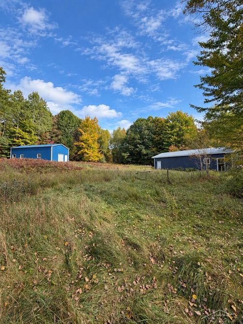 2102 Highland Springs Drive, Springfield Township, MI, 49680 | Card Image