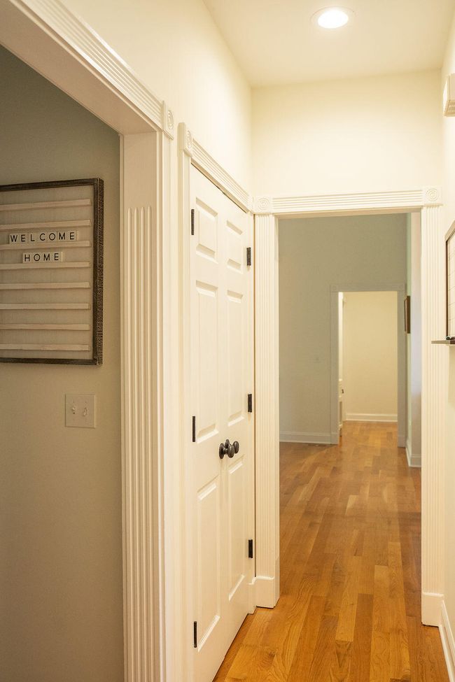 Hall leading to laundry room. | Image 60