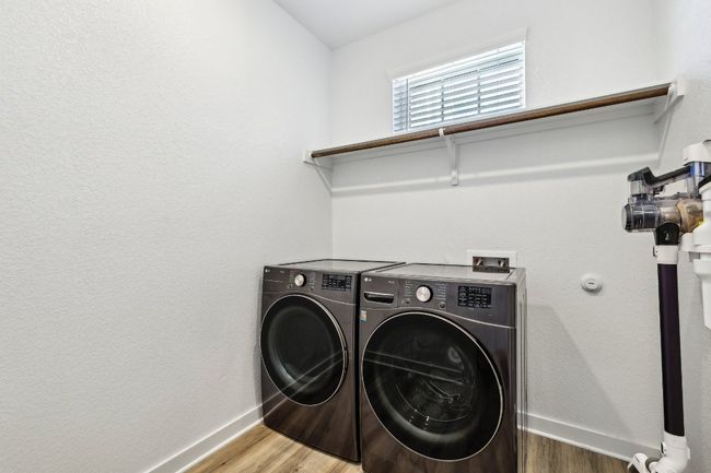Laundry made easy with this bright, spacious room just off the main living area. | Image 32