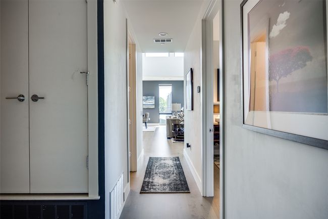 Hallway featuring wood finished floors and visible vents | Image 18