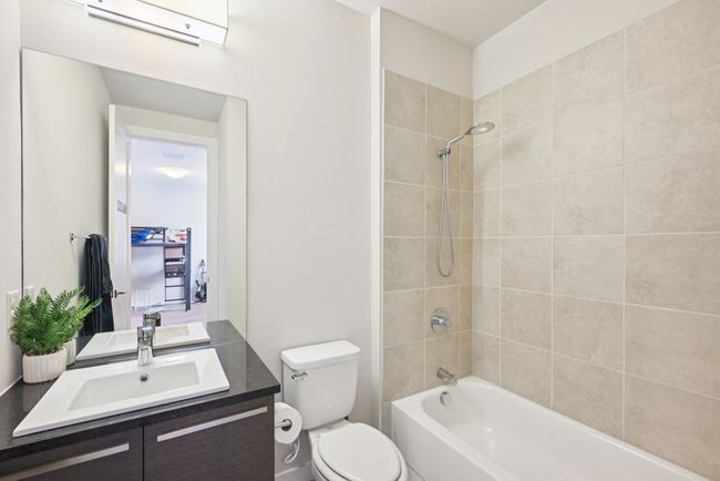 Full bath featuring vanity and shower / bath combination | Image 20