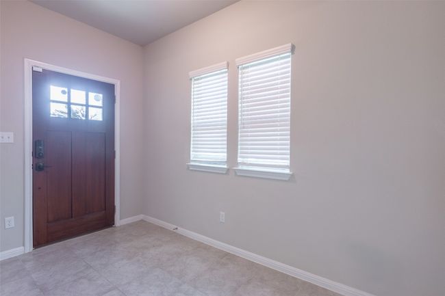 Entryway featuring baseboards | Image 38