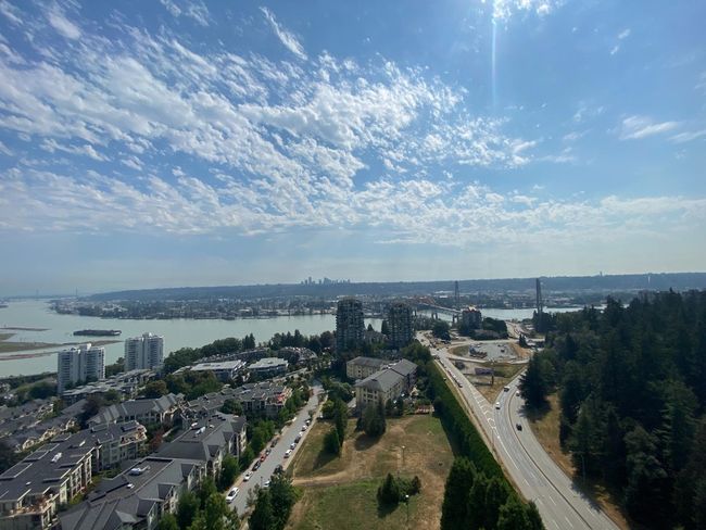View of urban area featuring a nearby body of water | Image 12
