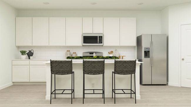 Kitchen featuring stainless steel appliances, light wood finished floors, a kitchen breakfast bar, and a center island | Image 12