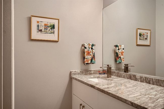 Bathroom featuring vanity | Image 7