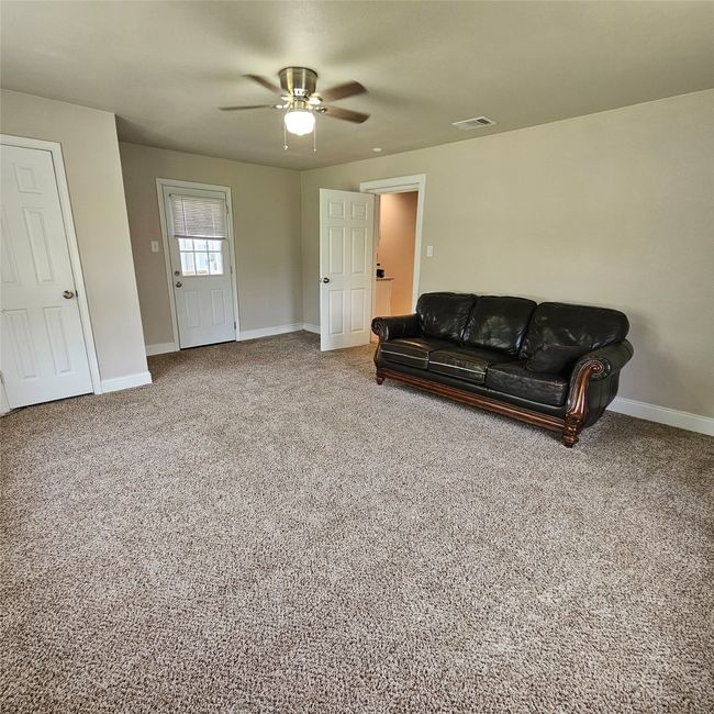 Bonus room with closet can be used as a spare bedroom or 2nd living room. | Image 14