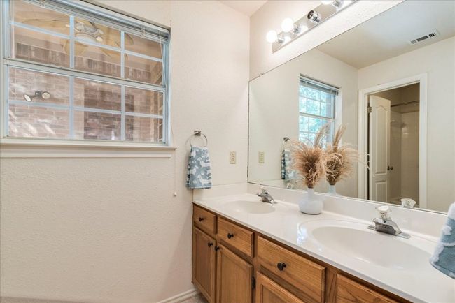 Second bath with dual vanities and separate toilet and tub area | Image 26
