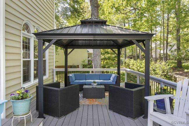 Wooden deck featuring an outdoor living space and a gazebo | Image 41