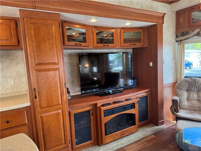 Living room featuring dark wood-type flooring | Image 5