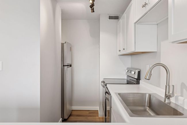 White cabinets and countertops | Image 20