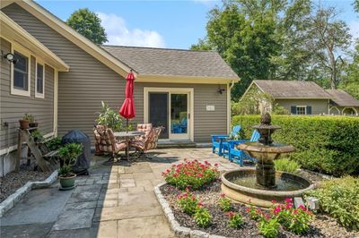 View of back yard patio / terrace and fountain | Image 3