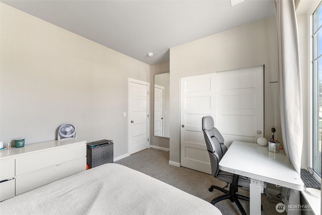 Main floor bright bedroom #2. | Image 10