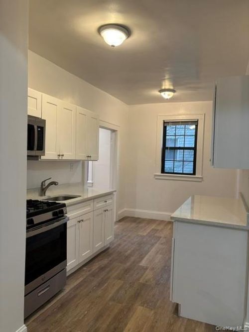 1d-28 W Neck Rd, Huntington, NY, 11743-2659 | Card Image