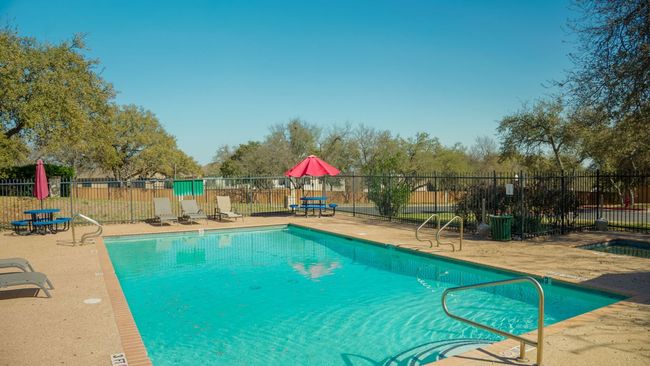 Community pool featuring a patio and fence | Image 6