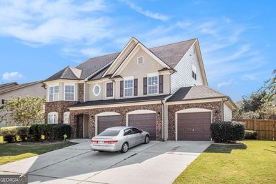 7380 Poppy Way, House other with 7 bedrooms, 4 bathrooms and 3 parking in Union City GA | Image 3