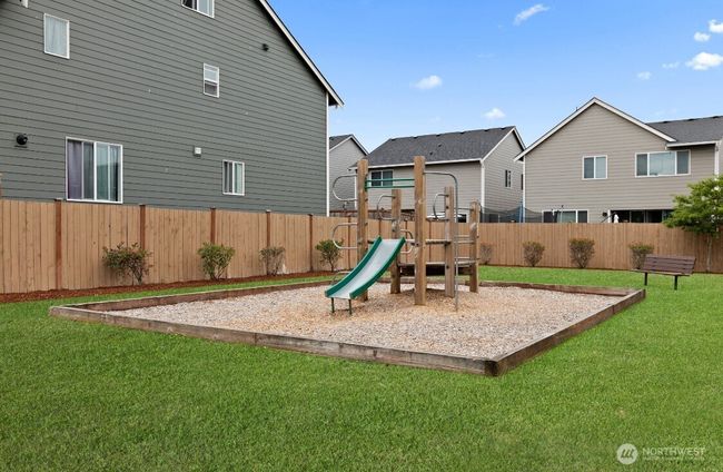 Enjoy the convenience of a play area right next door—perfect for quick outdoor fun, playdates, or relaxing with friends. | Image 28