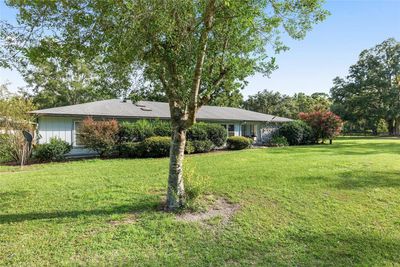 16525 Sw 5th Place, Home with 4 bedrooms, 3 bathrooms and null parking in Newberry FL | Image 2