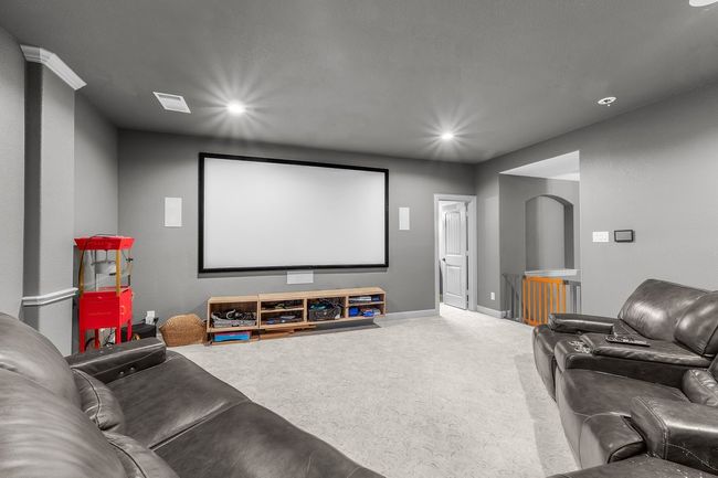 Home theater room with carpet floors, recessed lighting, and baseboards | Image 32