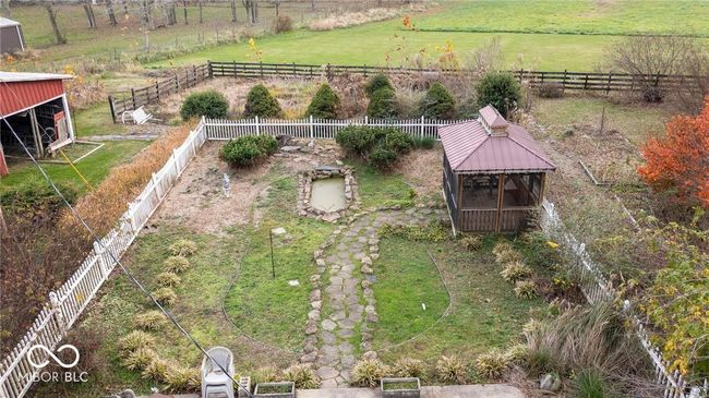 view of yard with a view of countryside and an outbuilding | Image 39