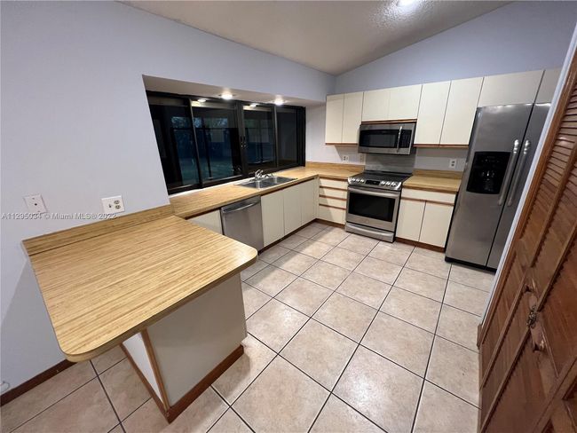 1921 Sw Hickock Ter, House other with 3 bedrooms, 2 bathrooms and null parking in Port St. Lucie FL | Image 5