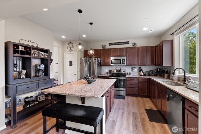 Granite countertops and large island | Image 5