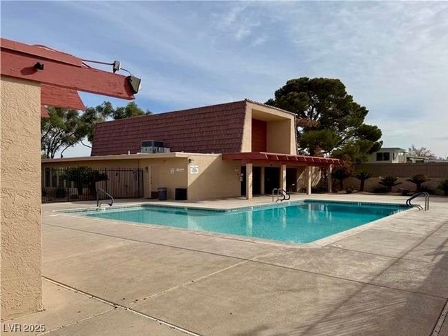 Community pool featuring a patio | Image 51