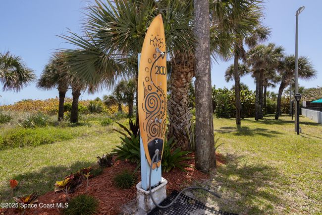 shower off the sand before tracking into the pool area. | Image 46