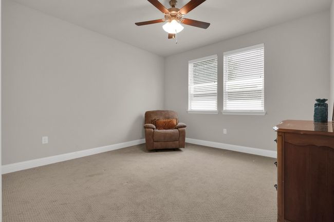 Bedroom #2 featuring baseboards, a ceiling fan, and carpet floors | Image 13