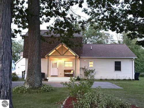 6038 Paradise Trl, Carp Lake, MI, 49718-9769 | Card Image