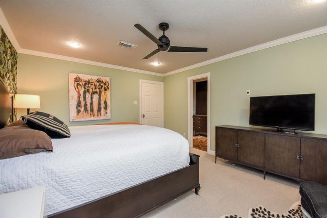 Another view of this wonderful secondary bedroom, shows the entrance to the ensuite bathroom. The perfect guest or mother inlaw suite. | Image 36