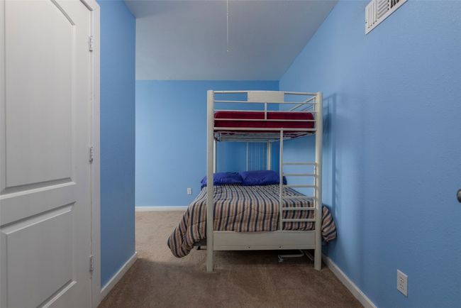 Bedroom featuring carpet flooring and baseboards | Image 24