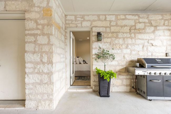 The attached private guest suite includes its own entrance for maximum independence. | Image 26