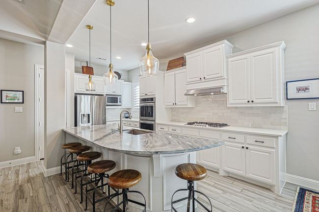 Eat at the island or move over to the breakfast nook. | Image 7