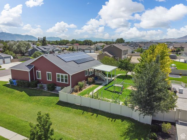 Aerial view of residential area with mountains | Image 41