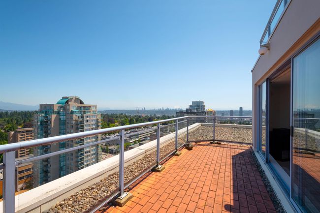 Balcony featuring a view of city | Image 27