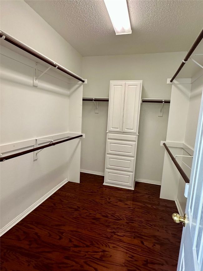 View of spacious closet | Image 13