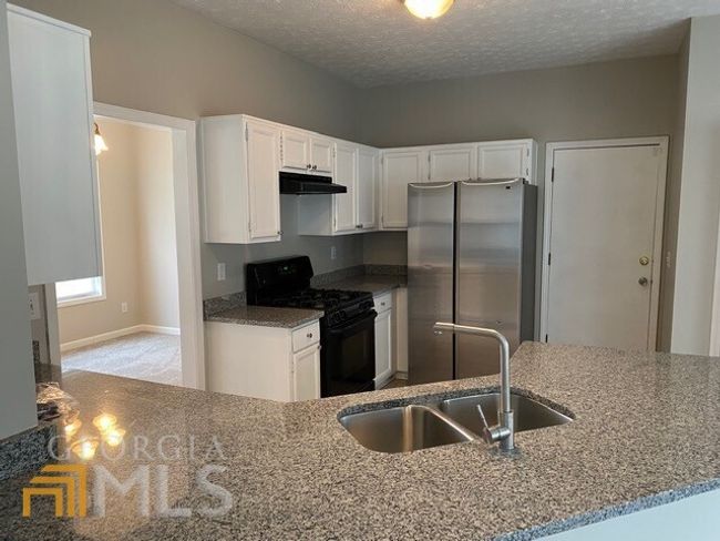 467 Stonemill Mnr, House other with 4 bedrooms, 3 bathrooms and null parking in Lithonia GA | Image 30
