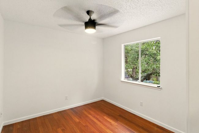 Well appointed 3rd bedroom and walk in closet. | Image 18