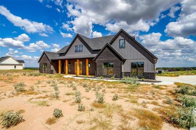 Side entry garage and extended driveway | Image 1