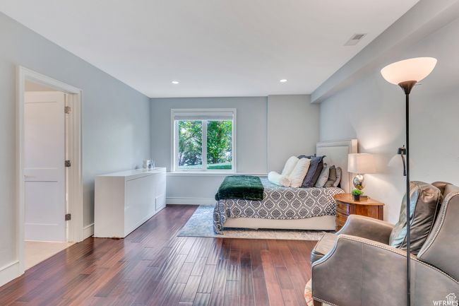 Bedroom featuring wood floors | Image 59