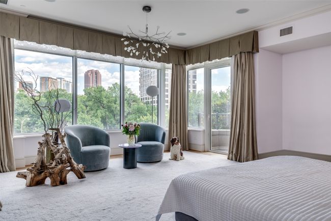 Primary bedroom opens to two step-out balconies. | Image 14