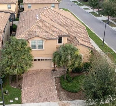 8879 Menton Loop, House other with 8 bedrooms, 6 bathrooms and null parking in Kissimmee FL | Image 3