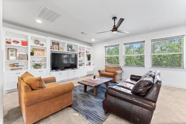 Upstairs living area, can be used as a game or media room | Image 31