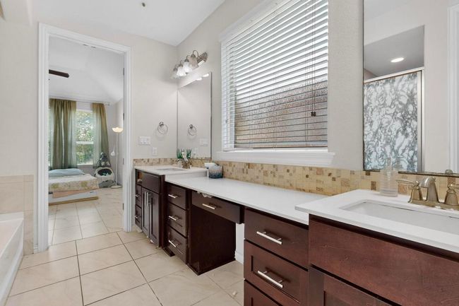 Bedroom featuring light marble finish floors and baseboards | Image 16