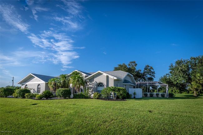 27406 Tierra Del Fuego Cir, House other with 4 bedrooms, 4 bathrooms and null parking in PUNTA GORDA FL | Image 76