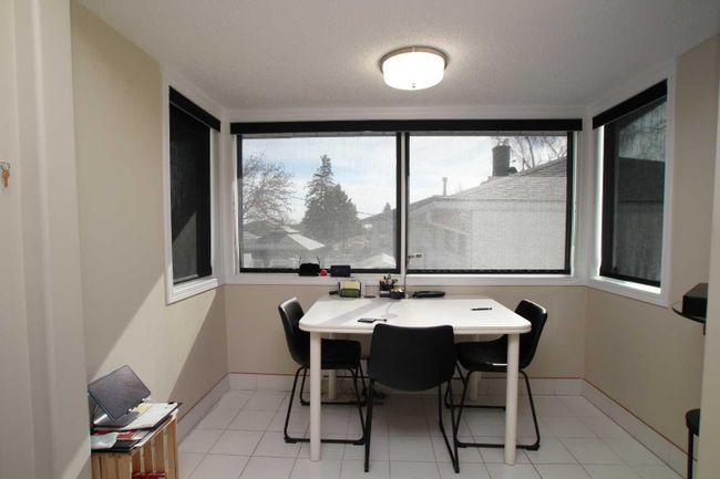 208 Spyhill Road Nw, Home with 3 bedrooms, 2 bathrooms and 2 parking in Calgary AB | Image 11
